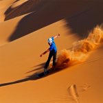 red dune desert safari sand boarding
